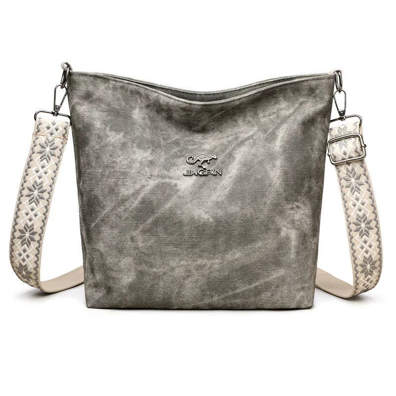 Soft PU large capacity crossbody bag in pink, grey, or yellow with an adjustable shoulder strap.