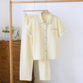 Washed cotton double-layer gauze trousers with three-quarter sleeves in Flower Sea pattern, showing loose fit and textured fabric