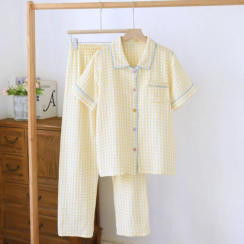 Washed cotton double-layer gauze trousers with three-quarter sleeves in Flower Sea pattern, showing loose fit and textured fabric