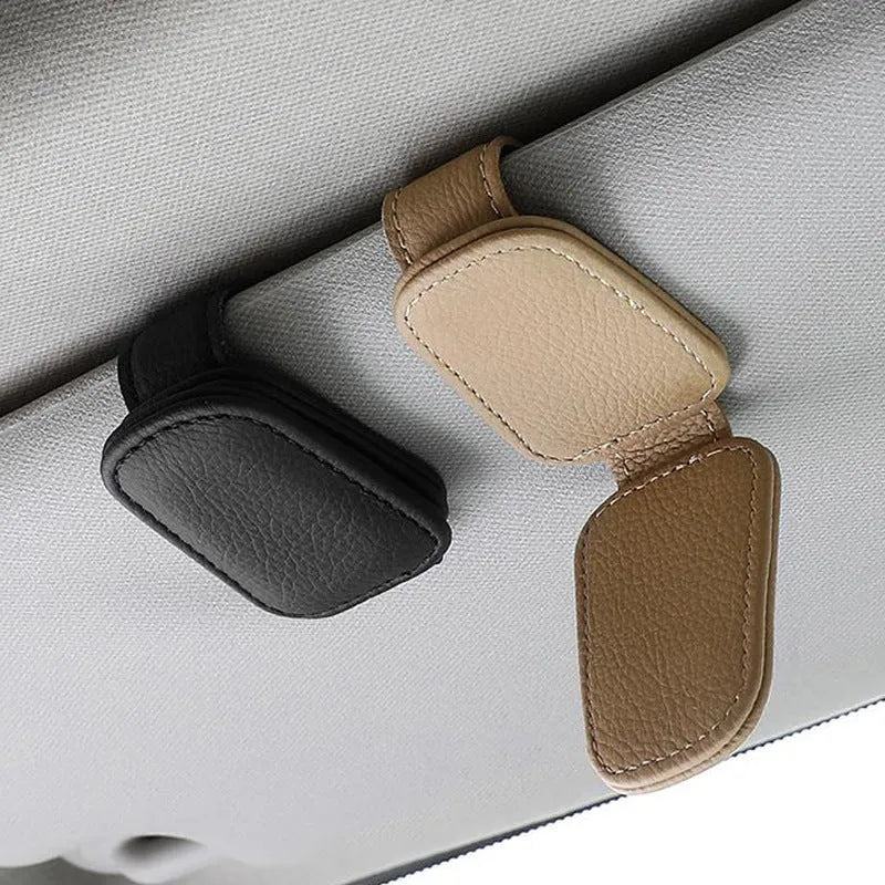 Car sunglasses holder clip with PU leather case attached to vehicle sun visor