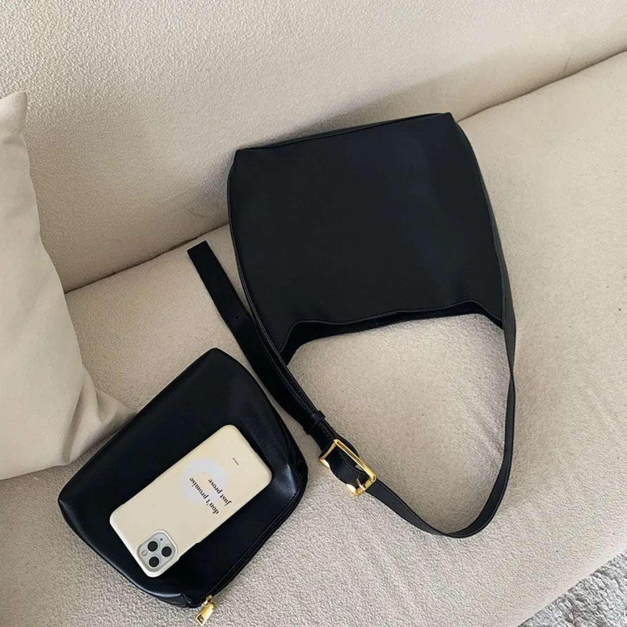 Two soft PU women's shoulder bags with swing threads decoration, shown in black and brown colour options.