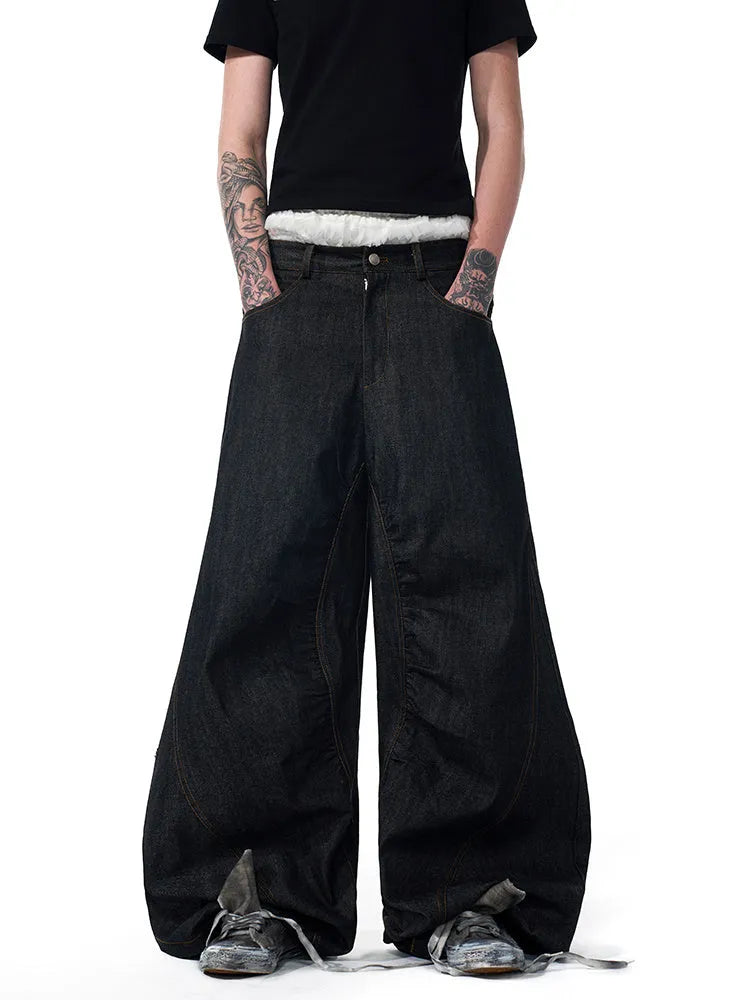 Black wide-leg women's jeans with colour-changing embroidery, shown in a loose straight fit.