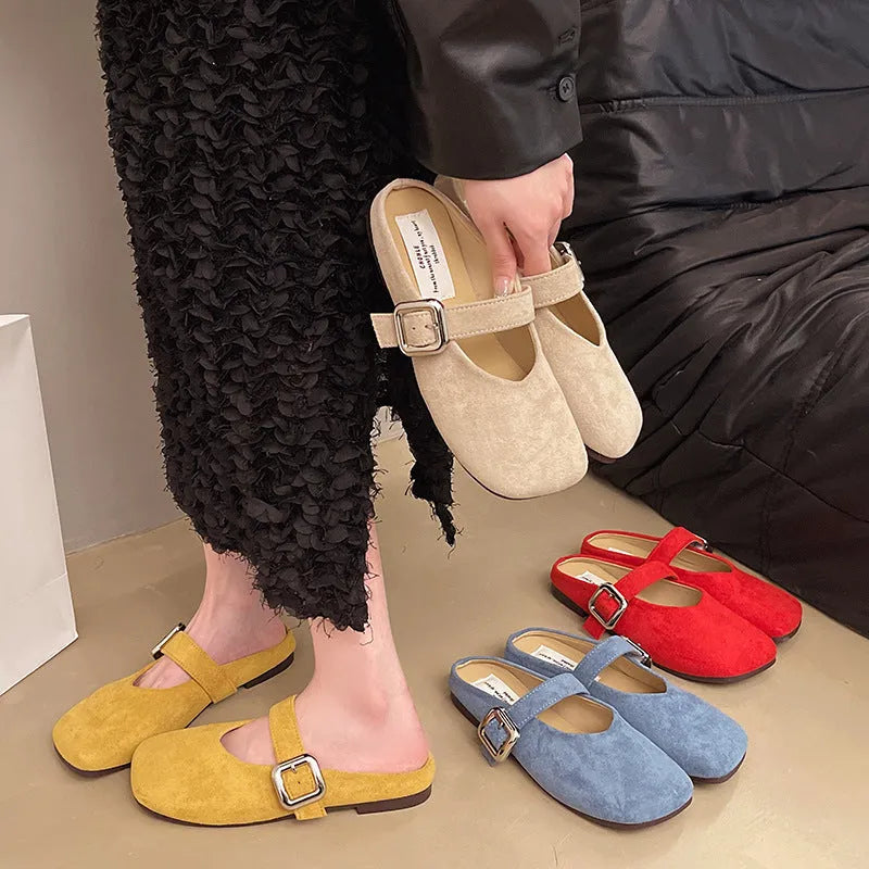 Women's flat closed-toe slippers in apricot colour with a square head design and rubber sole.