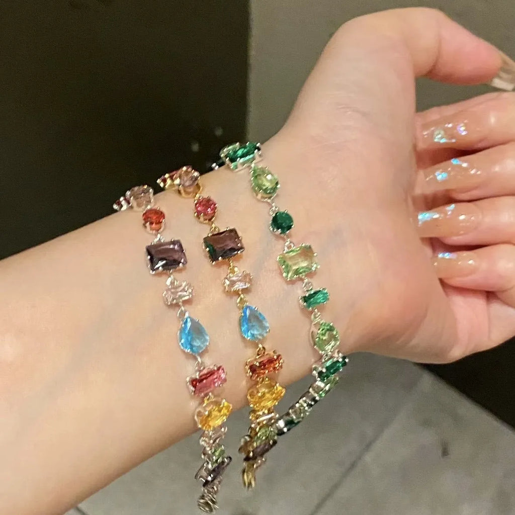 Irregular geometric zircon drop-shaped copper bracelet in gold or silver tone with coloured zircon inlay