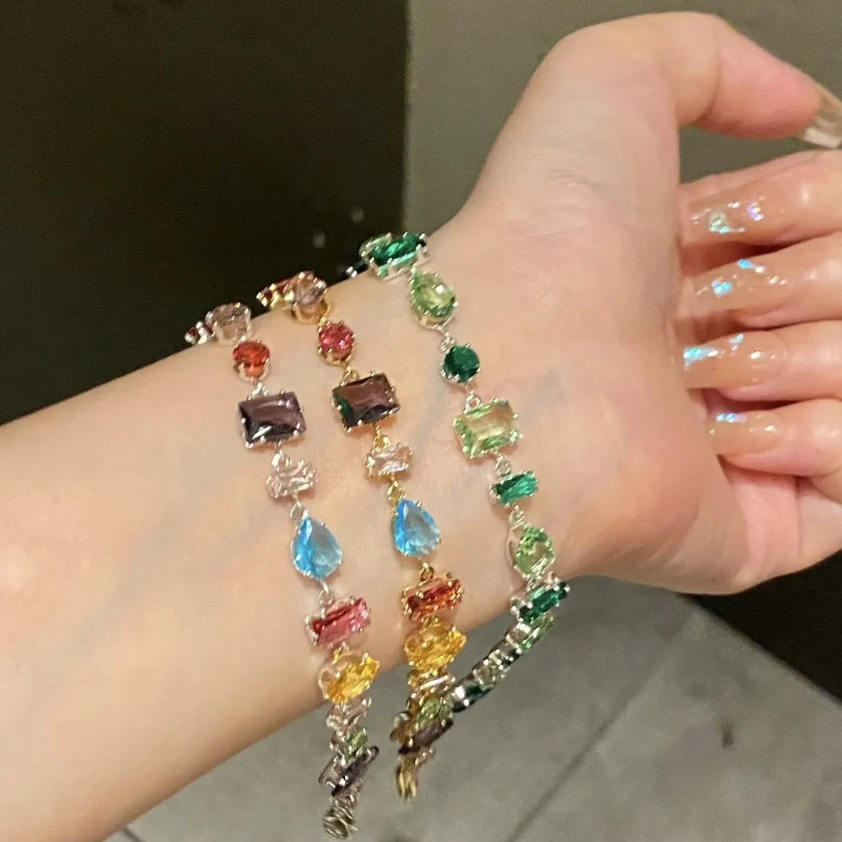 Irregular geometric zircon drop-shaped copper bracelet in gold or silver tone with coloured zircon inlay