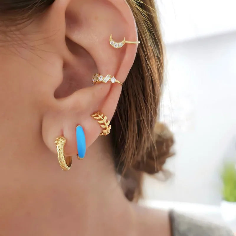 Geometric U-shaped epoxy earrings with oval elements in seven colour options on silver needle copper