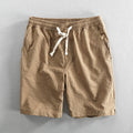 Men's striped casual shorts in light blue with micro elasticity, loose straight cut, and mid-waist design