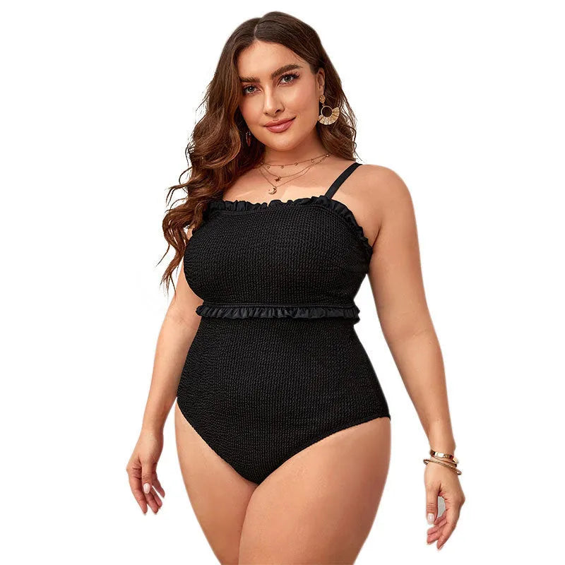 Black plus size one-piece swimsuit with double shoulder straps and solid colour design for water sports