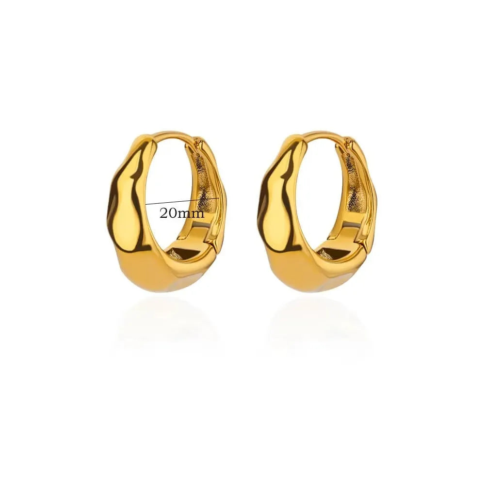 Women's irregular geometric butterfly earrings in copper with diamond treatment, showing heart-shaped and star design elements