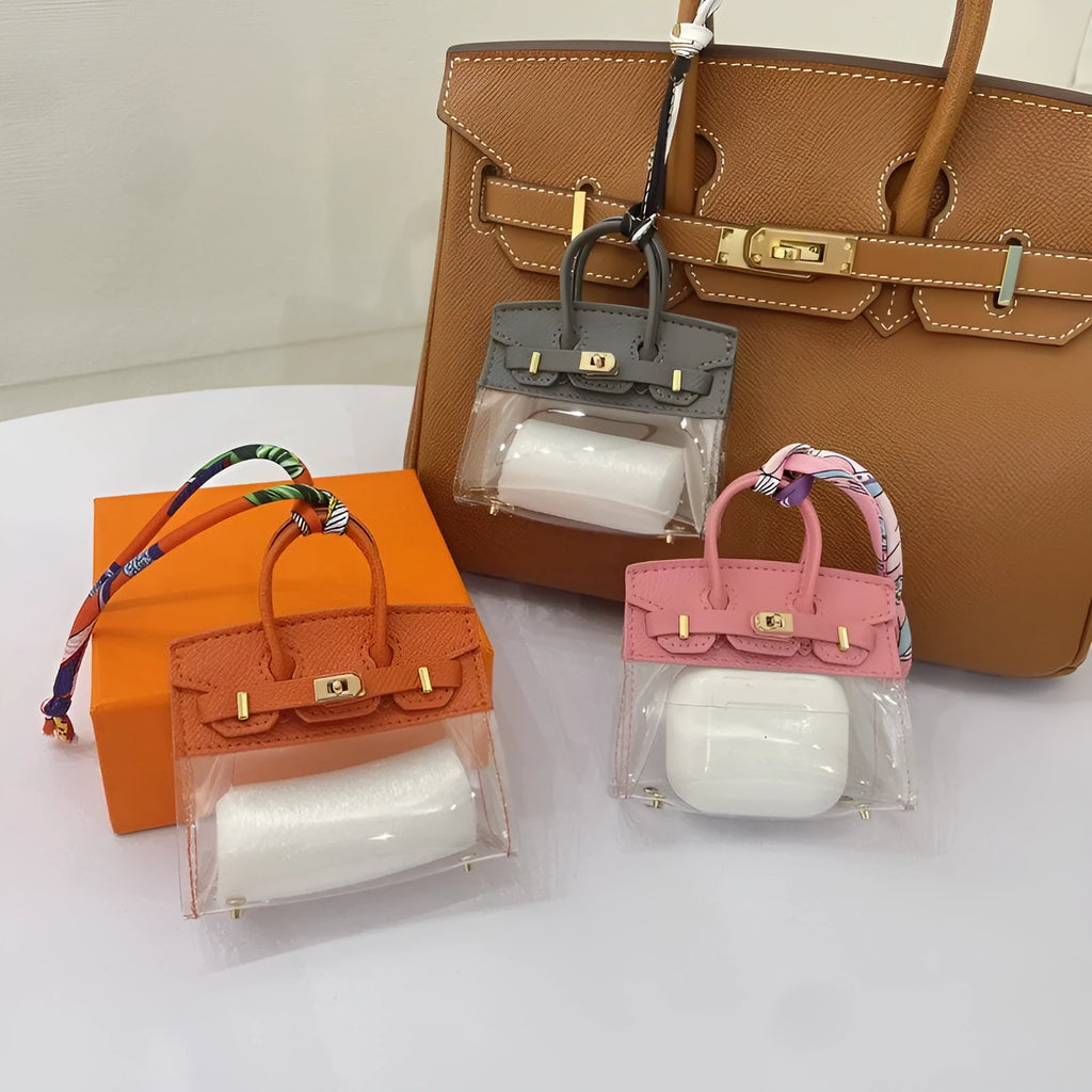 Women's artificial leather car key case showing luxury pattern designs in multiple colour options