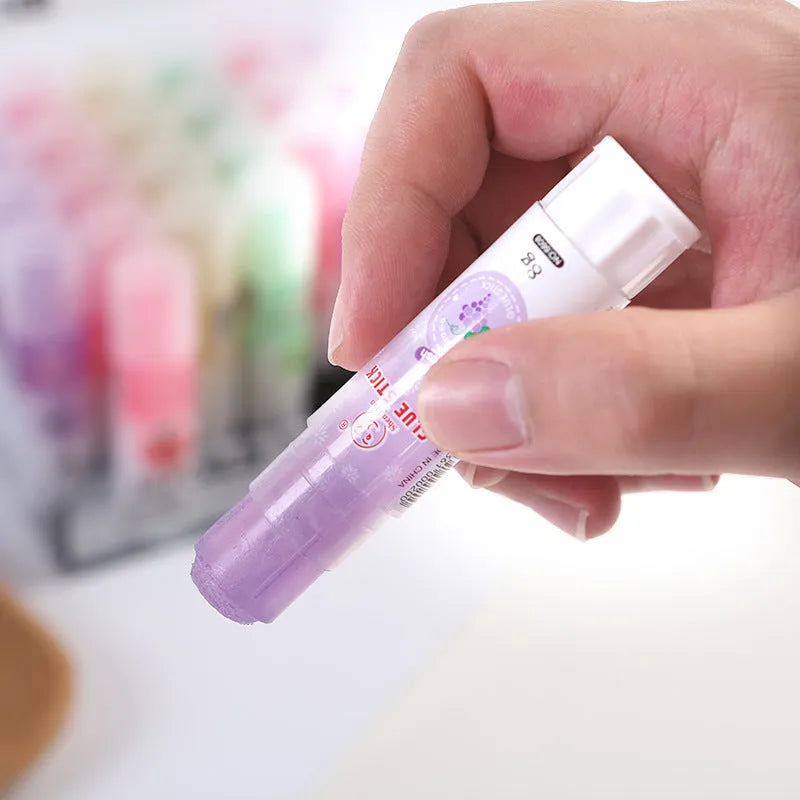 Jelly solid glue stick with fruit fragrance measuring 8.5cm long for craft and school projects