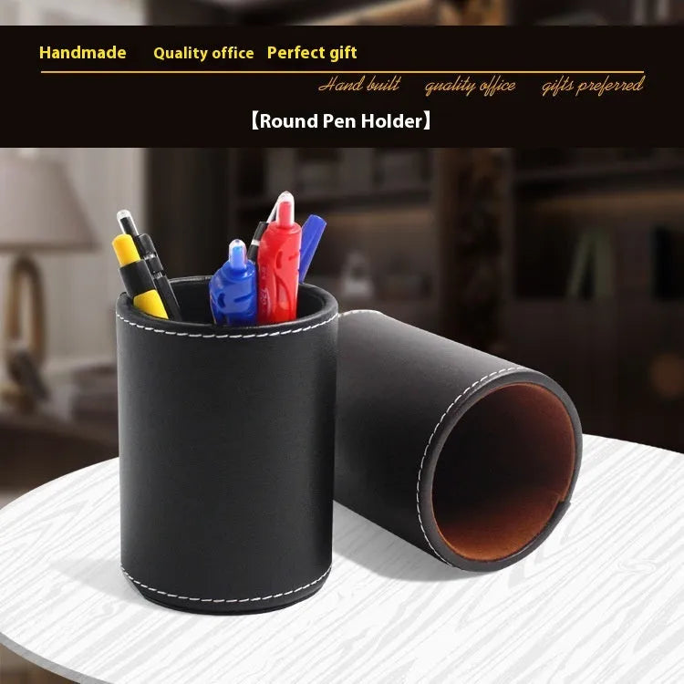 Round black leather pen container measuring 8.0cm diameter and 10.8cm height for desk organisation