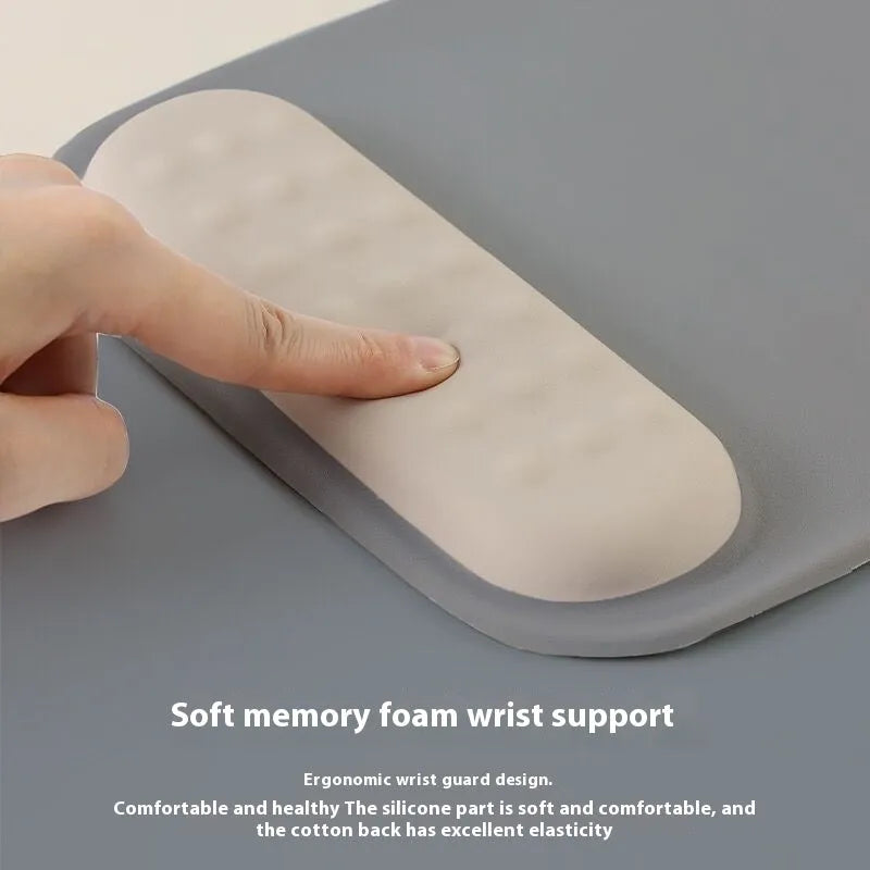 Ergonomic mouse pad with gel wrist support in mint green colour, showing 240x220mm work surface