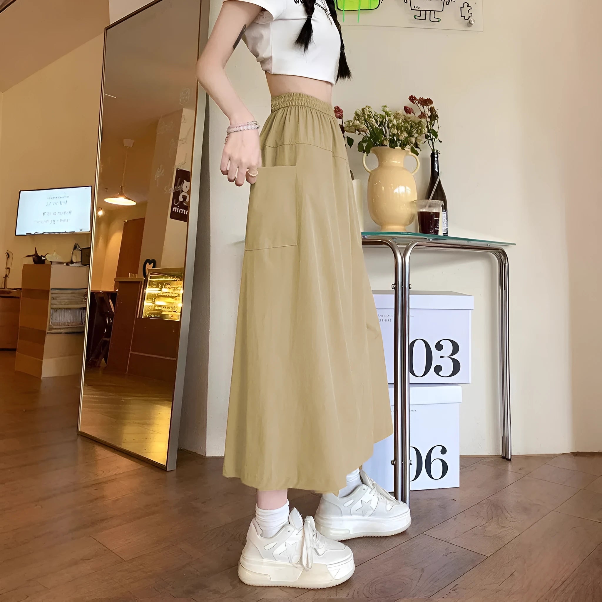 Camel coloured women's wide leg cropped casual skirt with an elastic waistband.