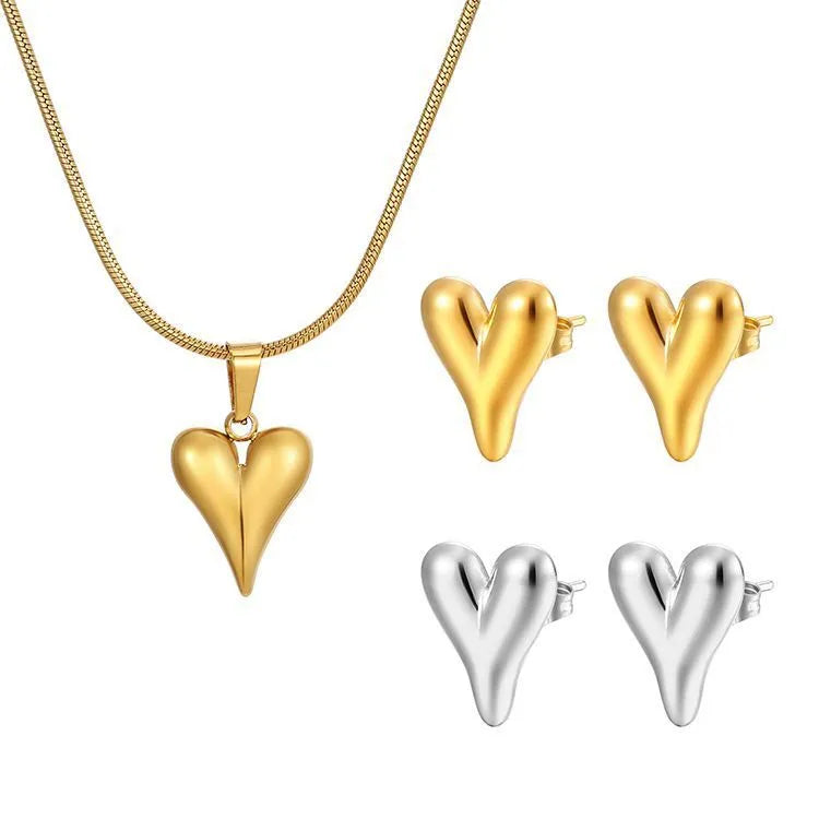 Heart-shaped stainless steel necklace with snake bone chain and matching earrings in gold or steel tone