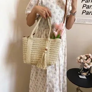 Women's straw crossbody shoulder bag with large capacity and polyester lining in milky white colour