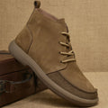Men's grey frosted leather Martin boots with wedge heel and lace-up front.