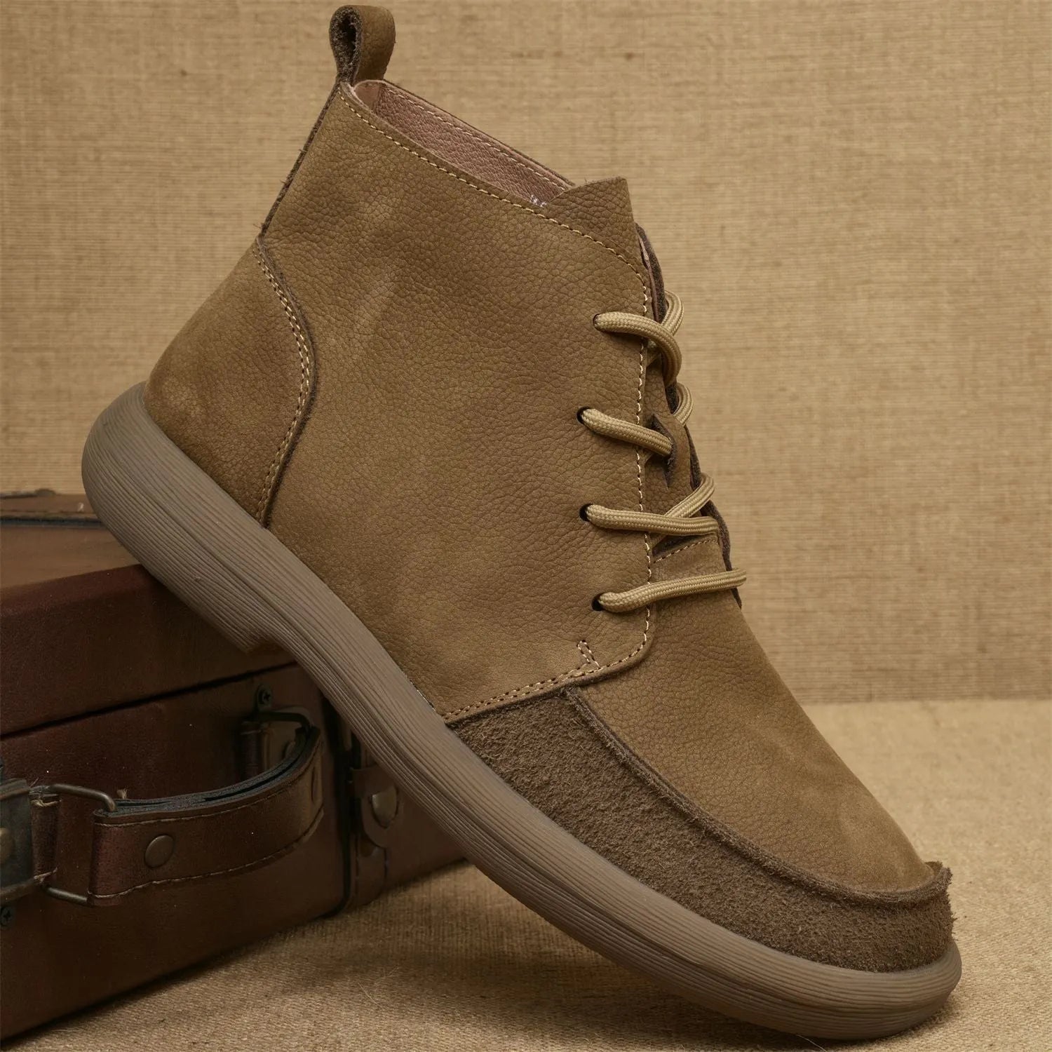 Men's grey frosted leather Martin boots with wedge heel and lace-up front.