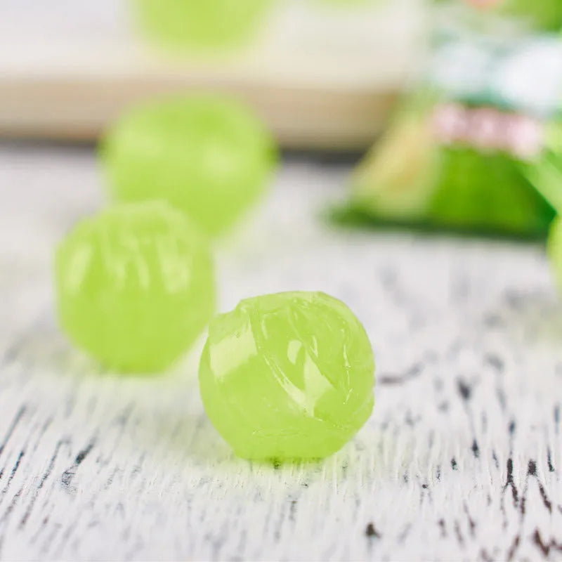 Assortment pack of plum sugar, guava, and tangerine peel flavoured hard candies in separate bags.