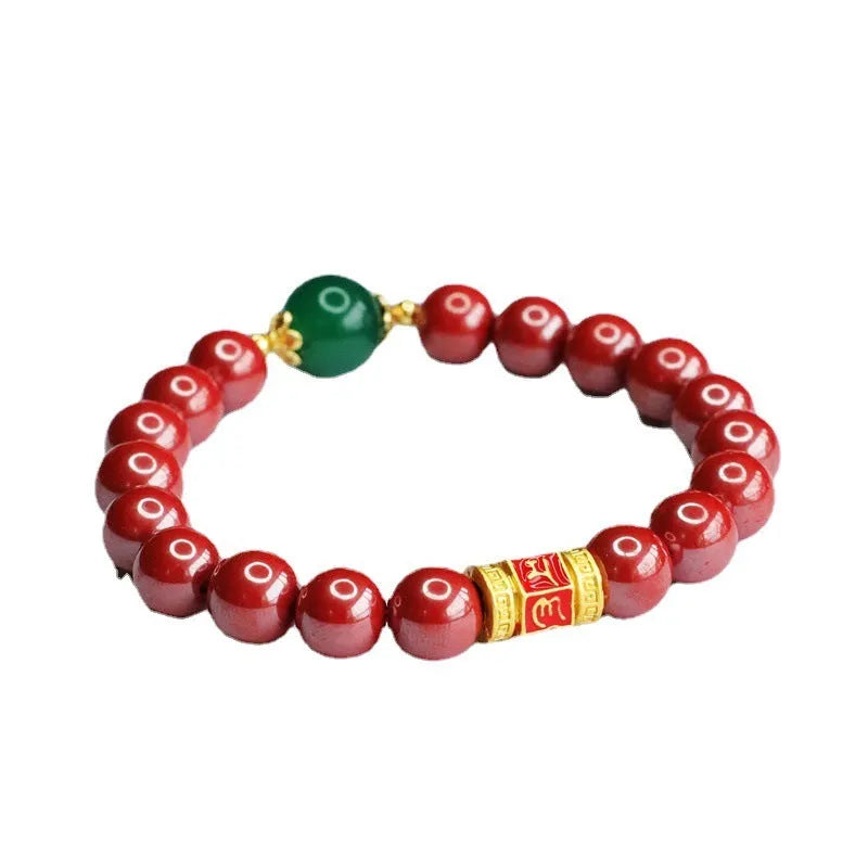 Emperor Sandstone coloured cinnabar bracelet with six engraved Chinese characters on 8mm beads.