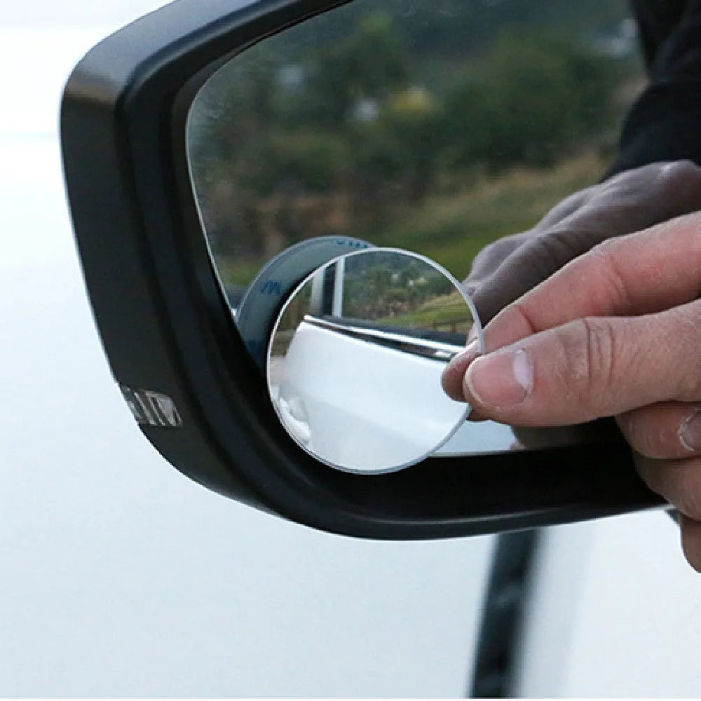 Silver 5cm round convex blind spot mirror with 360-degree adjustable mount for car rearview mirror.