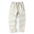 Cotton blend wide-leg trousers with elasticated waistband in milky white colour