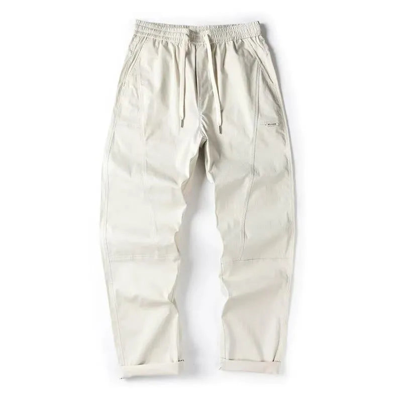 Cotton blend wide-leg trousers with elasticated waistband in milky white colour
