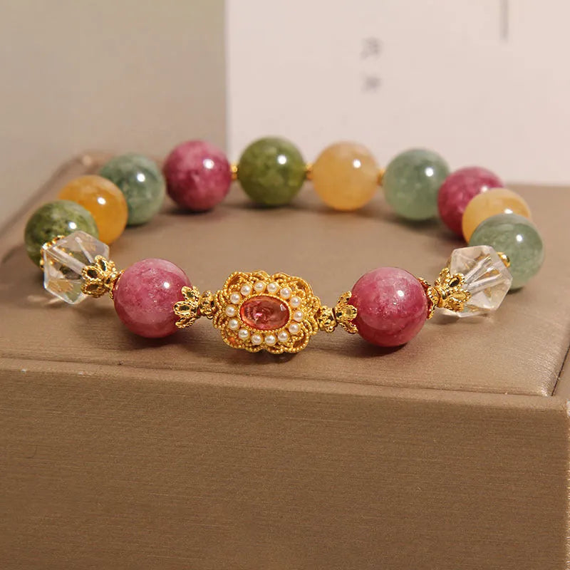 Jade colour tourmaline bracelet for women with alloy setting and rhinestone details on pearl crystal base.