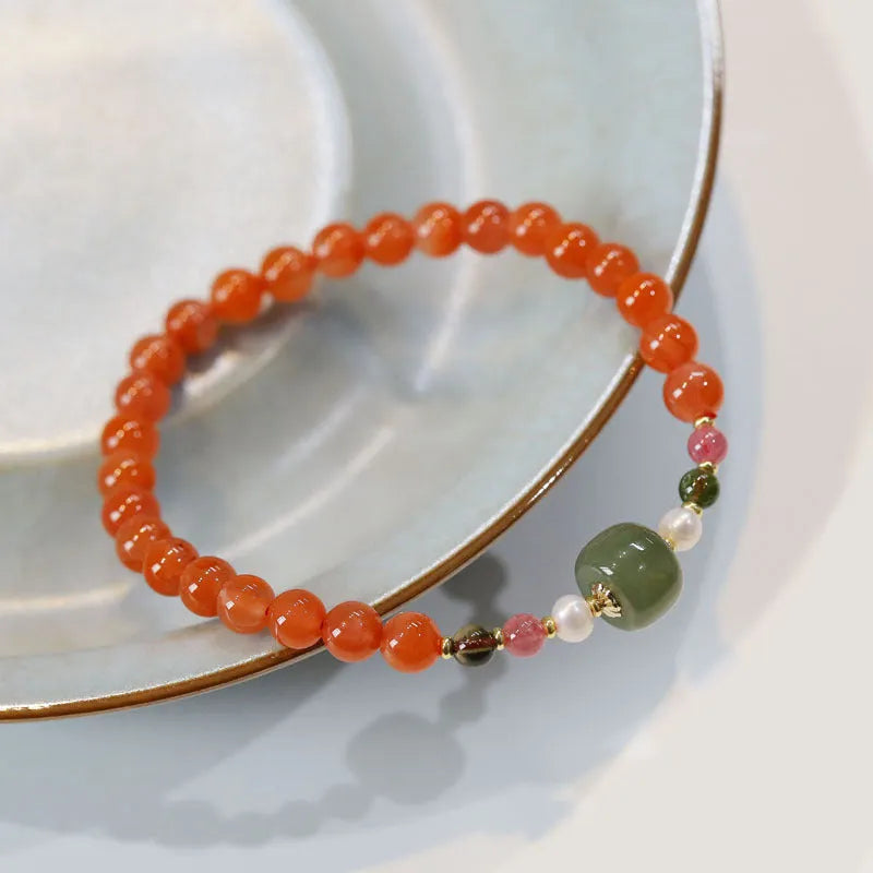 Natural Southern red agate women's bracelet with cherry red colour and polished round beads in ethnic retro style