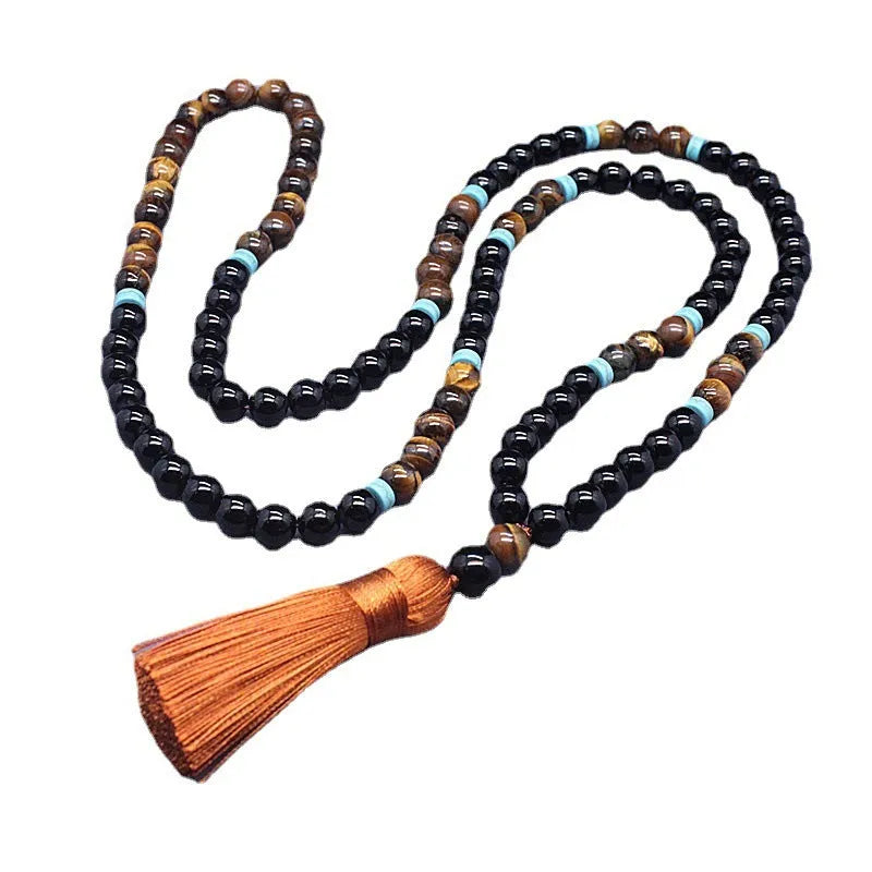 Black agate bracelet and matching necklace with tiger-shaped Tiger's Eye stones in geometric European-American design