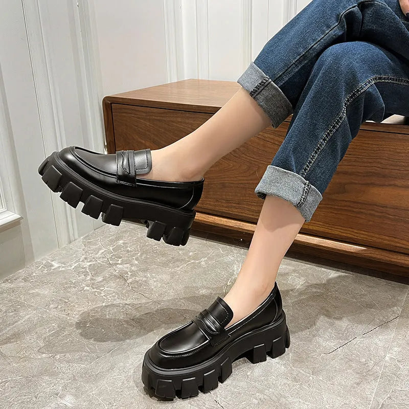 British-style wide-fit loafers with patent leather upper and 2.5cm rubber sole in matte or glossy finish