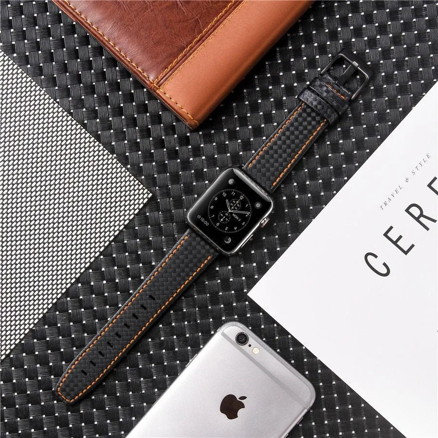 iPhone case with carbon fibre pattern and leather straps in red, black, orange, and blue colour options