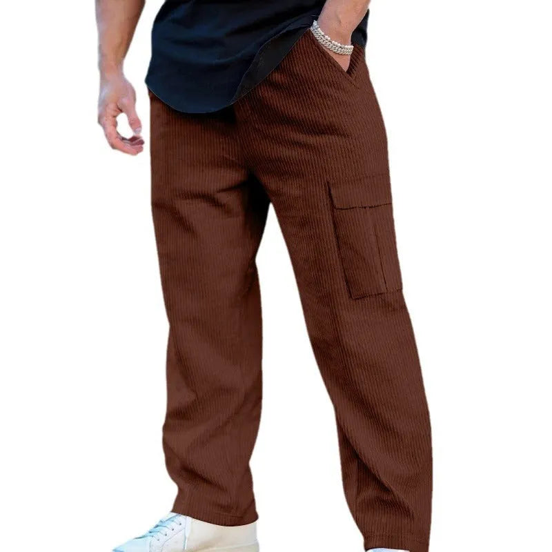 Men's straight-leg corduroy cargo trousers in navy blue with drawstring waist, suitable for casual autumn wear.