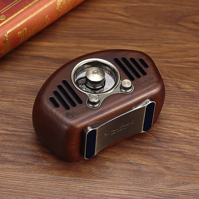 FMAM portable Bluetooth speaker with FM radio in Cherry or Walnut, 3600 mAh battery, USB interface.