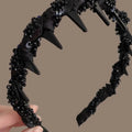 A wine red velvet hairband with crystal decorations, designed for non-slip use during face washing.