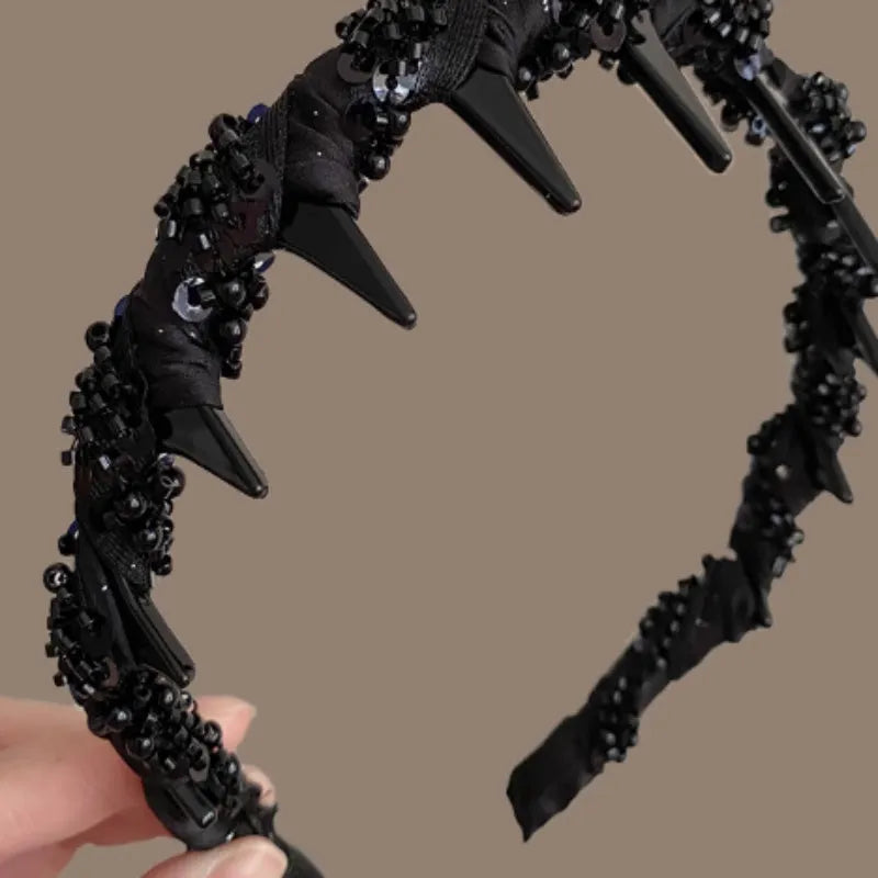 A wine red velvet hairband with crystal decorations, designed for non-slip use during face washing.