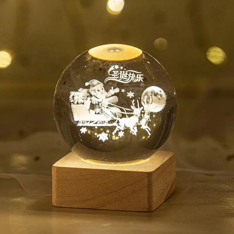 3D crystal ball night light projecting starry sky and planets from its 6cm sphere on a solid wood base.