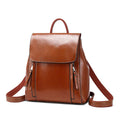 Women's genuine leather backpack in black with stitching details and multiple internal pockets