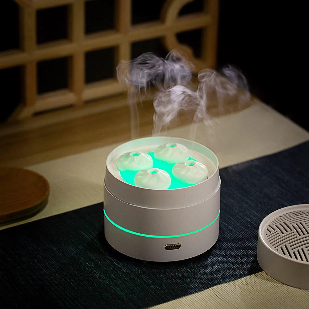 200ml USB ultrasonic aroma diffuser with four-spray design, steaming bun shape, and LED night light in Coffee or White