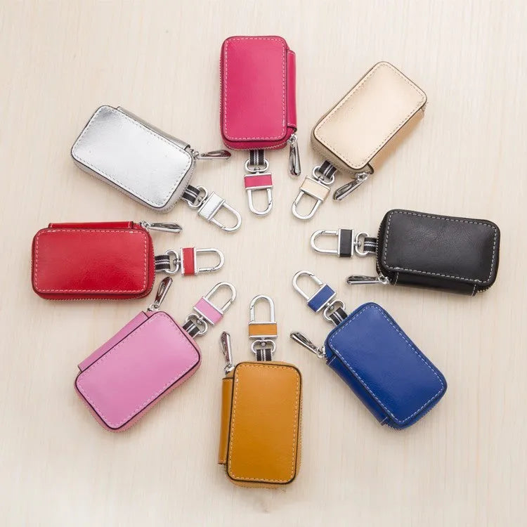 White genuine leather car key case with square vertical design and plain weave texture
