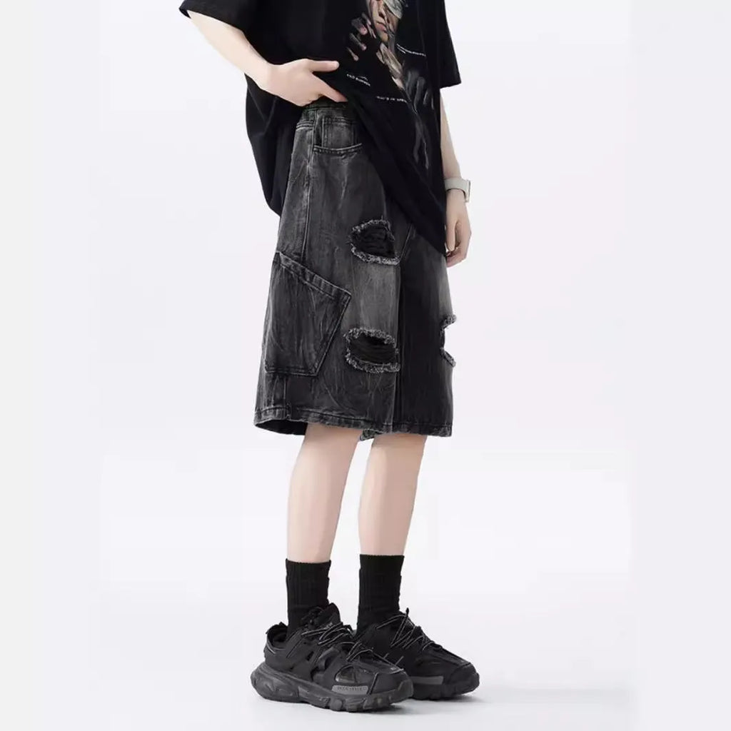 Retro loose-fit ripped denim shorts in washed black or blue with distressed detailing