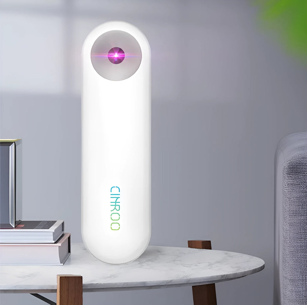White portable UV steriliser showing dimensions and 60-degree light angle for surface disinfection