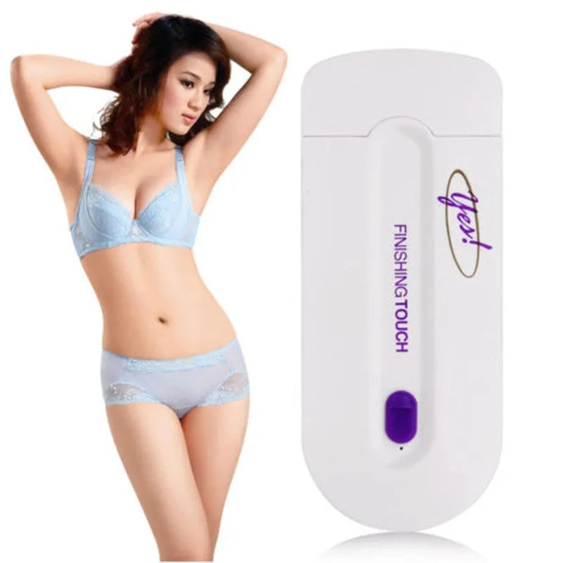 Finishing Touch electric hair removal instrument with Sensa-Light head and accessories on white background