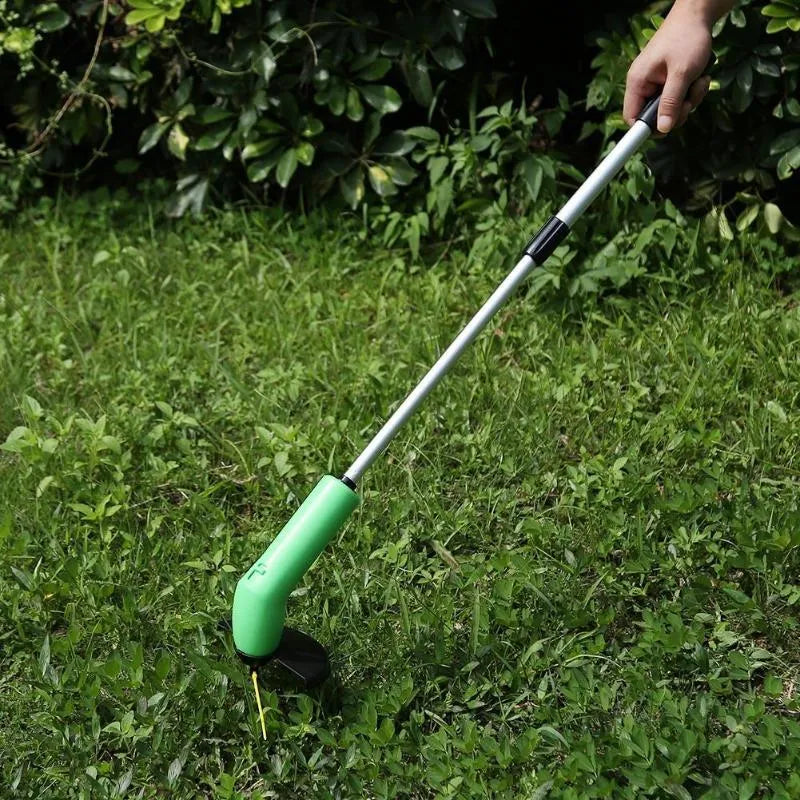 Cordless lawn trimmer with extension pole and protective debris shield for garden trimming tasks