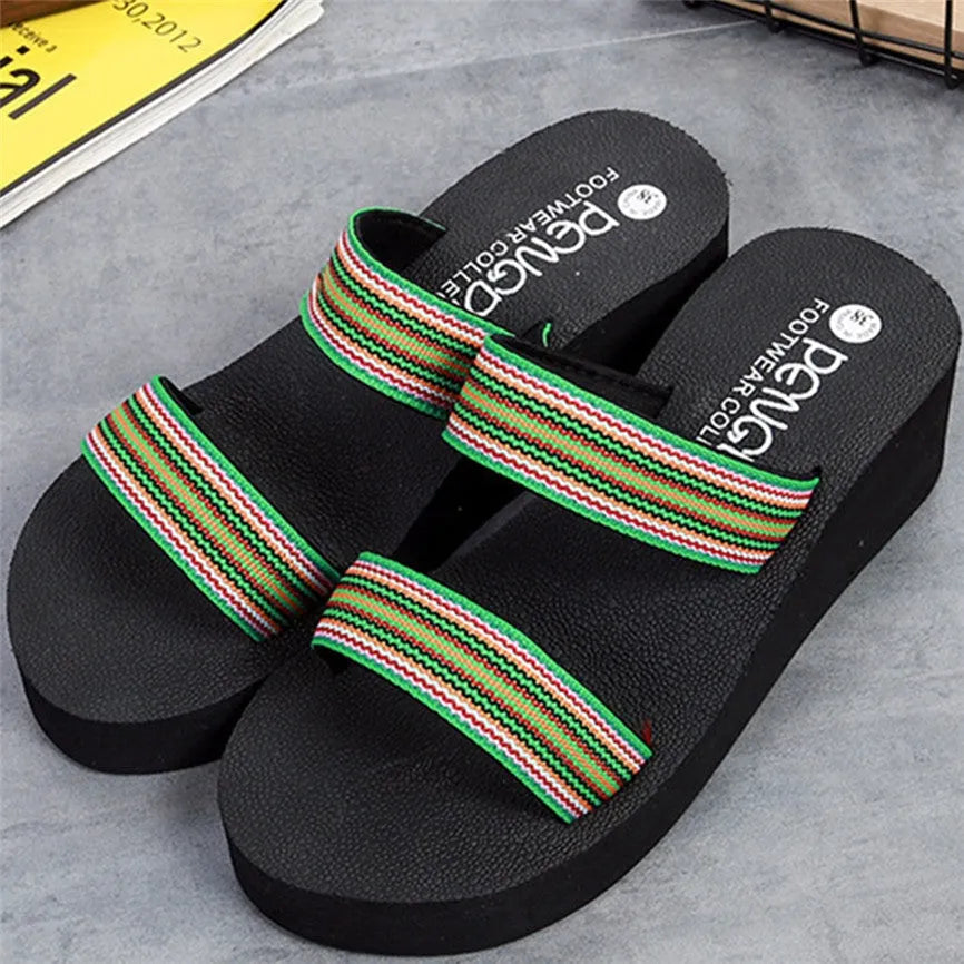 Women's bohemian slippers in brown with 5.5cm heel, high-elastic EVA upper, and rubber sole on a wooden floor.