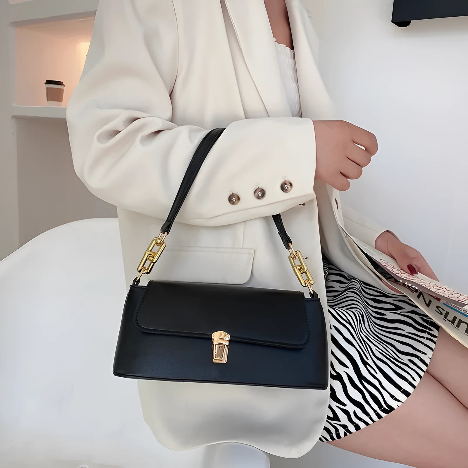 French casual brown PU underarm shoulder bag with chain strap and horizontal square sandwich pocket design.