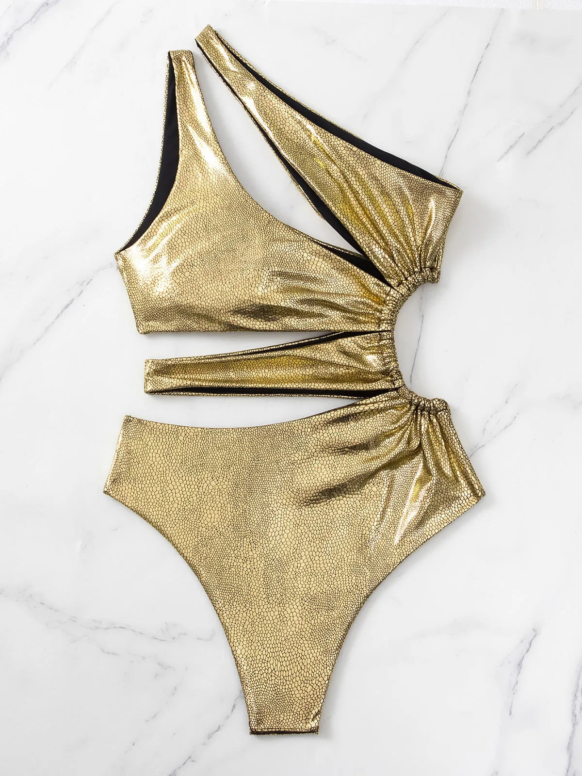 Women's one-piece swimsuit in solid gold colour with backless design and spandex material for high elasticity.