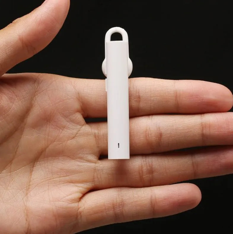 Compact black wireless Bluetooth headset showing 5.6cm length