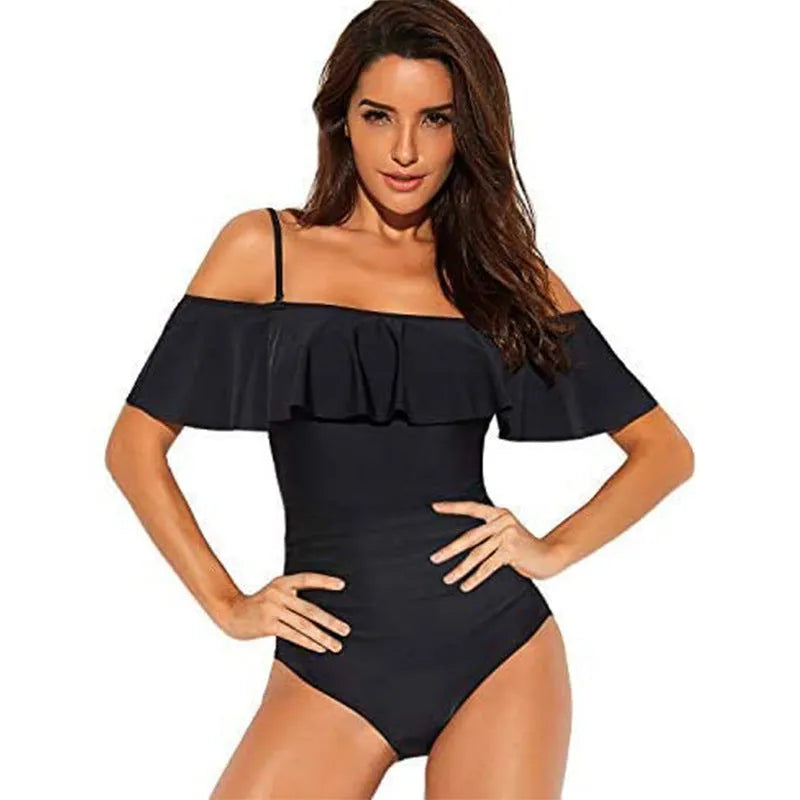 Black one-piece swimsuit with cut-out design and ruffled straps for swimming activities