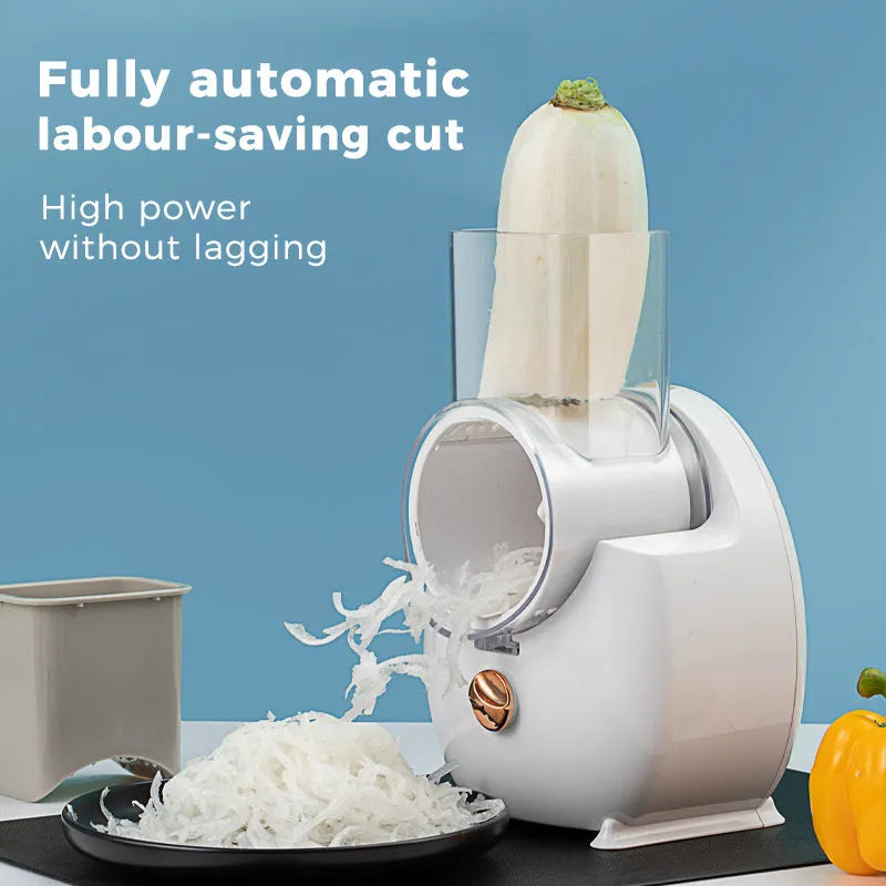 White electric vegetable slicer with rotary grater mechanism and suction base on kitchen counter
